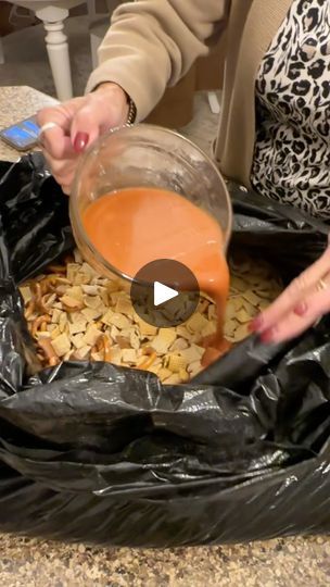 741K views · 5K reactions | Trash bag Chex mix! | Trash bag Chex mix! real recipe! Lisa shows you the famous Trash bag Chex mix recipe that is going viral. Its so easy, and was a hit at our party. A... | By Janelle & Kate | Okay so two bags. Two of the corn. One of the rice. One of the rice. Now we have honey nut trios. Eight cups of those if you go up like that. Whoo. Cheez Its. Look at all this in here. Oh wow. This is called Trash Bag Check Mix. This stuff is great on its own. It's even better and oh, wow. Look at that. Look at all that. Wow. And this is a non-scented trash bag. Of course, we have a gifted a clean trash bag but look at that. All that in there. Pretzels. Cute and they're holiday. And they're holiday pretzels. Oh, wow. Okay, my trash bag is getting so Okay. Now you take Trash Bag Chex Mix Recipe, Garbage Bag Chex Mix With Ranch, Trash Bag Snack, Check Mix Recipes Original, Garbage Bag Snack Mix With Popcorn Oil, Texas Trash Chex Mix Recipes With Bacon Grease, Chex Mix For A Large Crowd, Chex Mix White Trash Bag, Trash Bag Crackers Recipe