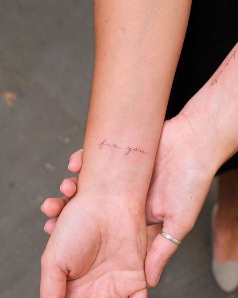 "Fix you" lettering tattoo handwritten on the wrist. Wrist Font Tattoo, Cursive Tattoo On Wrist, Writing On Wrist Tattoo, 222 Wrist Tattoo, Cursive Numbers Tattoo, Wrist Writing Tattoo, Handwritten Tattoo Ideas, Name On Wrist Tattoo, Wrist Tattoo Writing