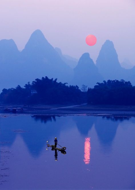 LI RIVER SUNSET - CHINA by Michael Sheridan. A Cormorant Fisherman at sunset on the Li River near Xingping - Guangxi Province, China. Guilin, Wonderful Places, Sunrise Sunset, Beautiful World, Beautiful Landscapes, Wonders Of The World, Bingo, Mother Nature, Beautiful Nature