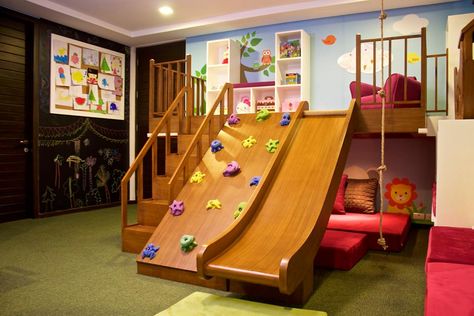 Treehouse inspired Play Loft complete with a rock climbing wall and slide.  by  Madhouse Design Studio - Graphic Factory Play Loft, Kids Rock Climbing, Cafe Vibes, Indoor Climbing Wall, Play Cafe, Phineas E Ferb, Indoor Playroom, Indoor Playhouse, Basement Playroom