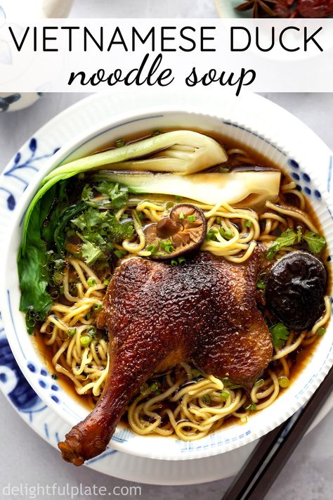 Vietnamese Duck Noodle Soup (Mi Vit Tiem) features slippery noodles, fall-off-the-bone duck legs, and a flavorful dark broth. Learn the easy method to cook this complexed dish at home. #vietnameserecipes #noodlesoups #duckrecipes Duck Broth Soup, Duck Legs Recipe Easy, Mine Bouille, Best Duck Recipe, Duck Noodle Soup, Gourmet Thanksgiving, Duck Dishes, Noodle Doodle, Asian Soups