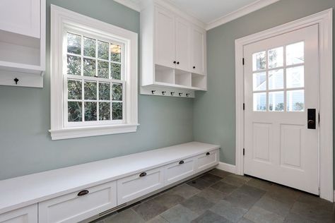 Beautiful white and gray mudroom with cabinet storage and bench Built In Mudroom, Gray Mudroom, Cottage Mudroom, Mudroom Renovation, Grey Floors, Mudroom Laundry Room Ideas, Tv Fireplace, Amp Storage, Mudroom Storage Bench