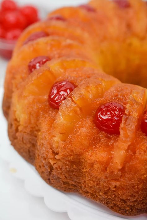 The Ultimate Pineapple Upside-Down Bundt Cake Recipe Cake Mix Pineapple Upside Down Cake, Pineapple Upside Down Bundt Cake Recipe, Pineapple Upside Down Bundt Cake, Pineapple Upside Down Bundt, Upside Down Bundt Cake, Upside Down Pineapple Cake, Pineapple Upside Cake, Pineapple Upside Down Cake Recipe, Easy Bundt Cake Recipes