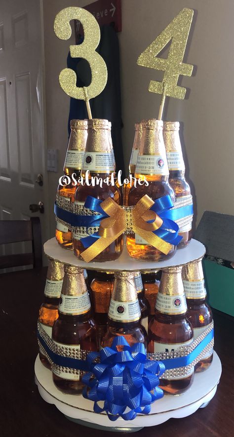 Modelo Party Theme, Modelo Beer Theme Party, Beer Centerpieces For Men, School Halloween Party Decorations, Modelo Beer Cake, Birthday Party Table Centerpieces, Beer Centerpieces, 21st Birthday Beer Cake, Beer Themed Birthday Party