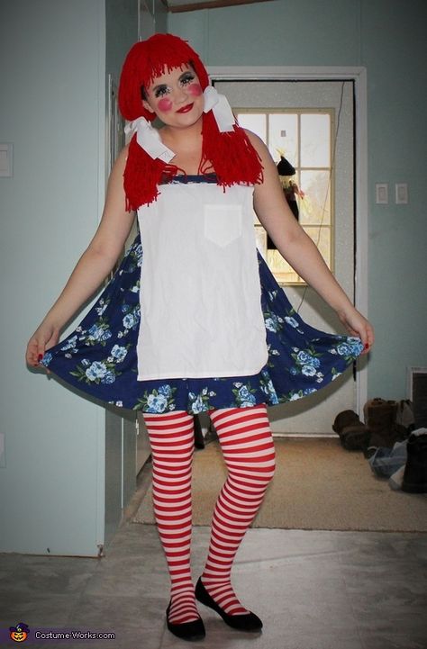 Katelyn: I Handmade my costume and i bought my daughters. I got the idea after seeing my daughters costume to make mine. I made my costume from red yarn, red string,... Raggedy Ann Costume Women, Raggedy Ann Halloween Costume, Raggedy Ann Costume, Rag Doll Costume, Old Dress, Striped Stockings, Costume Works, Holloween Costume, Homemade Costumes