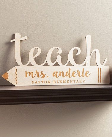 Your favorite teacher will love to decorate their classroom or home with this Personalized Teacher Wood Plaque. The personalization is laser engraved into the wood for a beautiful look. Teach can be personalized with their name of up to 18 characters on the first line and any other text of your choice of up to 24 characters on the second line. Personalize #1 Teacher with a name of up to 18 characters. Personalize Apple with 2 lines of text of up to 12 characters each. Apple choice includes a sta Teacher Name Signs, Wood Keepsake, Laser Cut Wood Crafts, Classroom Signs, Teacher Signs, Laser Engraved Ideas, Teacher Personalized, Teacher Name, Woodworking Jigs