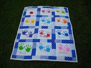 Best one yet. Handprint Quilt. Would be Soooo cute as an end of the year present for Miles' teacher. Better start planning this now. Hotel Notepad, Handprint Quilt, Christmas Present Quilt, Family Hand Prints, Quilt Instructions, Twenty Something, Halloween Crafts Preschool, Auction Projects, Bottle Cap Art