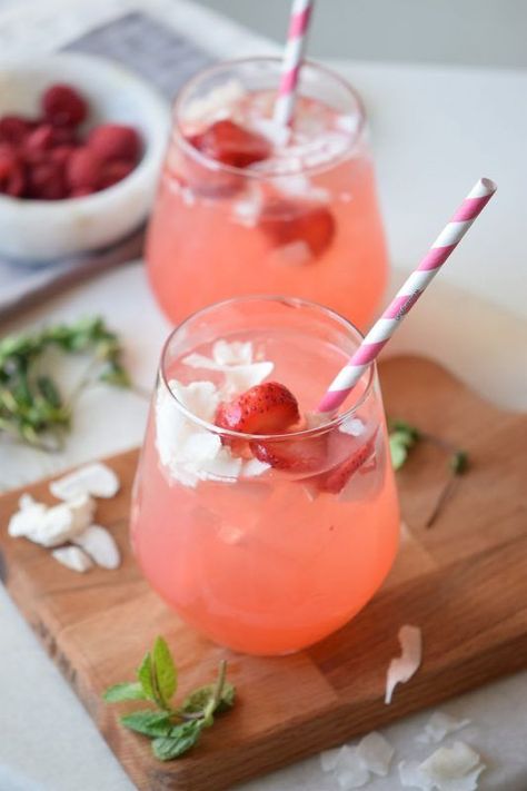 Grab some strawberries and coconut flakes and get mixing up a yummy mocktail. This recipe is perfectly refreshing. Strawberry Coconut Mocktail Recipe By Remodelaholic.com Coconut Mocktail, Alcohol Mixers, Bartender Drinks, Mixer Recipes, Classic Cocktail Recipes, Mixed Drinks Recipes, Pretty Drinks, Mocktail Recipe, Smoothie Shakes