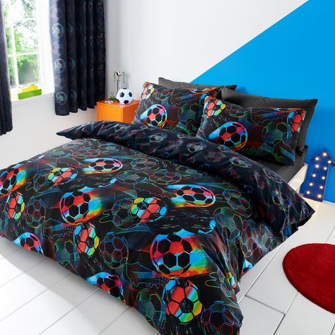 * Reversible football design * Includes matching standard pillowcase(s) * Machine washable * Secure closure * Coordinating eyelet curtain available to purchase separately A must-have for any young sports enthusiast's bedroom. This vibrant bedding ensemble not only showcases an exciting football themed design but also offers versatility with its reversible feature, allowing you to switch up the look whenever you please. Crafted for convenience, the set includes matching standard pillowcase(s) for Boys Football Bedroom, Football Themed Room, Boys Bedroom Accessories, Kids Toddler Bed, Vibrant Bedding, Boy Sports Bedroom, Football Bedroom, Boys Bedroom Paint, Bedroom Transformation