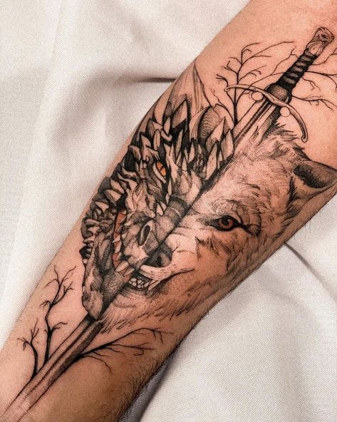 22 Powerful Game Of Thrones Tattoo Ideas For Hardcore Fans 7 Game Of Thrones Tattoos For Women, Finish Tattoo Ideas, Game Of Thrones Sleeve, House Of Dragon Tattoo Ideas, Protector Tattoo Ideas, Drogon Game Of Thrones Tattoos, Direwolf Tattoo, House Stark Tattoo, Got Dragon Tattoo