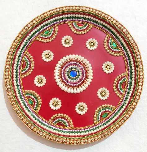 Diy Puja Thali. How to make Decorative Puja Plate. For order contact me on 7066765582. #sainagiftsnglitz #pujaplate #handmade #decorated #like #follow #share #pujathali #red #exclusive #order #youtube #crafting #followmypage #likes Diy Puja Thali, Harathi Plate Decoration Ideas, Aarti Plate Decoration, Decorative Plates Diy, Aarti Decoration, Thali Ideas, Thali Design, Engagement Basket, Happy Diwali Cards