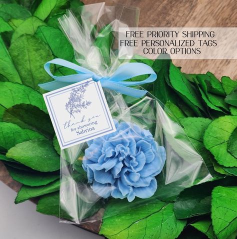 Blue floral party favors Give your event a personal touch with our personalized favors! Your guests will love these adorable soap favors! --- Hand poured shea butter soaps scented with essential oils --- Each favor is individually wrapped and includes a personalized tag, satin bow --- Satin bow color will match soap color choice --- Each soap weighs approx. one ounce each --- Each soap measures approx. 2.5  inches across and weighs approx. 1 ounce --- Available in four scents: Jasmine rose Laven Blue Bridal Shower Favors, Blue Wedding Favors, Wedding Shower Signs, Rehearsal Dinner Favors, Quinceanera Favors, Bridal Shower Tags, Something Blue Bridal, Blue Bridal Shower, Dusty Blue Wedding