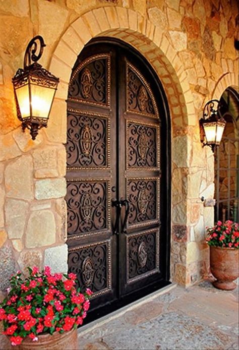 Spanish Style Door that brings a warm and masculine look. www.giselanajera.pacificsothebysrealty.com We can help you get your dream home stone look at exceptionalstone.com ! Doors, Building