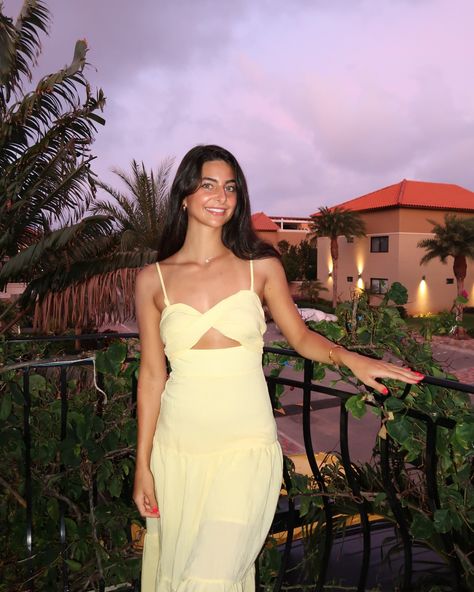 vacation outfit, dress, summer dress, long, yellow, maxi dress, yellow, maxi, linen dress, yellow dress on tan skin, vacation, yellow dress, linen, yellow dress, sunset, Aruba, photo pose, balcony photoshoot, Sunset background, island time, island, vacation, long, dark hair curled hair, summer hair, summer outfit, night out outfit, date night outfit, on the town outfit vacation dress perfect maxi dress purple sunset, yellow, vibe, nighttime aesthetic night, aesthetic, canon, G7, X flash photo, palm trees, air bnb  #aruba #hellomollydress #hellomolly #maxidress #papamiento #arubaonehappyisland #travel #travelblogger Balcony Photoshoot, Yellow Vibe, Nighttime Aesthetic, Photoshoot Sunset, Hair Curled, Town Outfits, Sunset Yellow, Curled Hair, Flash Photo