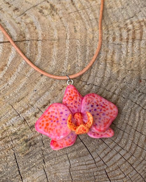 new orchid necklaces available in my shop! link in bio 🌺🌸✨ #orchid #orchidjewelry #orchidnecklace #pendantnecklace #handmadejewelry Orchid Clay, Clay Orchid, Orchid Necklace, Orchid Jewelry, Necklace Polymer Clay, Vintage Silver Jewelry, Leather Cord Necklace, Leather Corded Necklace, Dope Jewelry