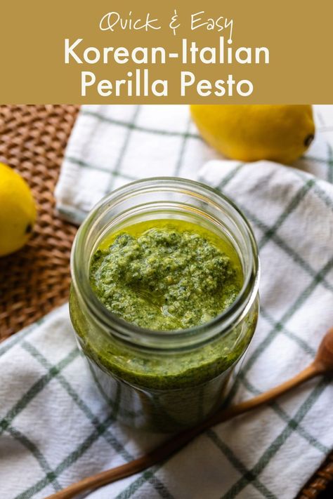 An overhead shot of bright green perilla pesto in a glass jar. The pesto sits on a wicker mat and a green/white towel. A wooden spoon also sits on the kitchen towel. Lemons sits next to the jar as well. Perilla Leaves Recipes, Perilla Leaves, 2024 Meals, Mint Pesto, Easy Pasta Sauce, Dry Rub Recipes, Fusion Dishes, Italian Recipes Traditional, Flavored Butter