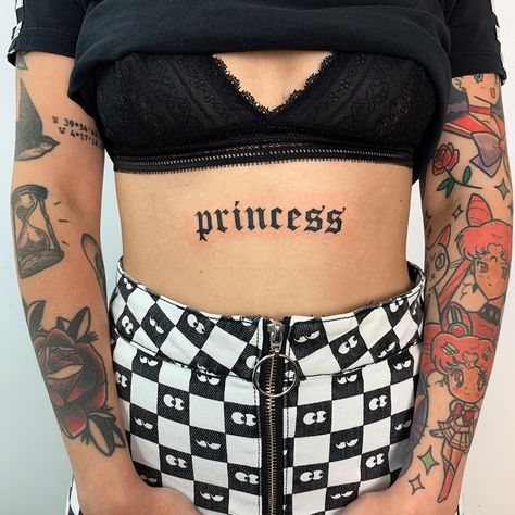 Gothic Tattoo Lettering, Princess Word Tattoo, Gothic Word Tattoo, Stomach Lettering Tattoo Women, Gothic Text Tattoo, Princess Tattoo Writing, Gothic Lettering Tattoo, Princess Tattoo Ideas, Princess Tattoos