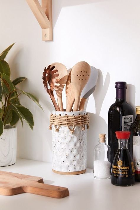 MamasLatinas.com : Help your friend avoid a messy drawer of utensils by getting her this holder. : 30 Housewarming gifts that will turn a new space into a home -- On cooking days, messy kitchens are unavoidable, but the Neya Utensil Holder will make any kitchen instantly look more organized. The ceramic holder features a woven twist design that gives it a boho feel. It'll look great in your kitchen, but it also makes an affordable housewarming gift. Buy it for $29 at Urban Outfitters. Rattan Decor, Replacing Kitchen Countertops, Ceramic Utensil Holder, Utensil Holders, American Kitchen, Bright Kitchens, Metal Kitchen, Woven Rattan, Cooking Essentials