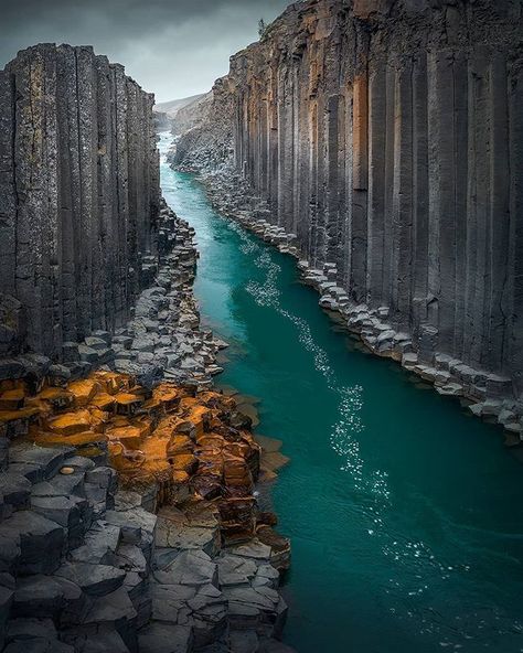 "Columnar Jointing" The cathedral-like cliff formation surrounding the turquoise blue river is majestic. 🌊 #iceland .  @beyondthelands |… Iceland Wallpaper, Iceland Nature, Future Architecture, Iceland Landscape, Iceland Photos, Blue River, Sunset Wallpaper, Beautiful Landscape Wallpaper, Fantasy Art Landscapes