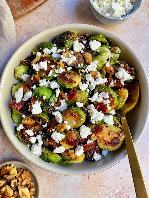 Elevate your veggie side dish game with these irresistible maple bacon Brussels sprouts, featuring crispy bacon, sweet maple syrup and crumbly goat cheese. This post contains affiliate links These maple bacon Brussels sprouts may convert even some of the most loyal Brussels sprouts haters. These Brussels sprouts are crispy, slightly sweet and smoky and so delicious. I got inspiration for this recipe from Josie's Table, a favorite local restaurant of mine from my Capital Region Restaurant Gui Brussels Sprout Goat Cheese, Bacon Goat Cheese Brussel Sprouts, Brussel Sprout Recipes With Bacon And Goat Cheese, Roasted Brussel Sprouts Goat Cheese, Brussels Sprouts Goat Cheese, Brussel Sprout Feta Recipes, Brussel Sprout Goat Cheese Recipes, Brussel Sprout Recipes With Goat Cheese, Goat Cheese Brussel Sprouts