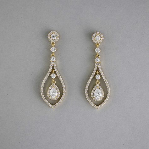 Glistening teardrop-shaped CZ earrings, crafted in layers of timeless beauty, will add a touch of subtle elegance to your bridal look. These earrings are rhodium or gold plated, hypoallergenic, lead, nickel, and cadmium free, and made with AAA CZ stones. They measure about 2 inches long and 5/8 inches wide and have post pierced backs. . #earrings #earringstyle #earringslover #earringstagram #earringsaddict #earringsforsale #earringsoftheday #earringsofinstagram #bridaljewelry #bridaljewelryc... Wedding Day Earrings Brides, Bride Hair Down, Teardrop Bridal Earrings, Fav Products, Teardrop Jewelry, Weaving Ideas, Gold Earrings Wedding, Wedding Day Jewelry, Pinterest Ideas