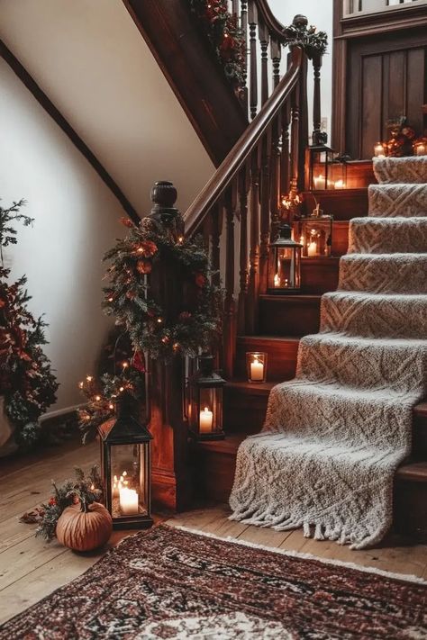 Fall staircase adorned with a mix of real and faux gourds in various sizes and colors Autumn Staircase Decor, Candles On Staircase, Stockings On Staircase, Candle Staircase, Halloween Staircase Decor, Fall Staircase Decor, Fall Staircase, Wedding Staircase Decoration, Stair Landing Decor