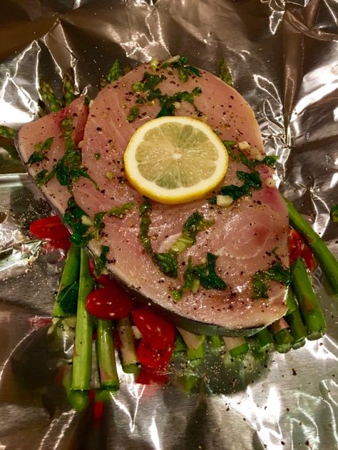 Cooking in foil makes dinner preparation and clean up a breeze! Swordfish Steak Recipe, Steak Foil Packets, Tin Foil Meals, Foil Meals, Fancy Meals, Delicious Entrees, Fish Dinners, Swordfish Recipes, Foil Pack Meals