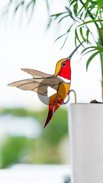 114 likes, 1 comments - va_gifts on September 16, 2024: "Looking to add some charm to your space? 🏠This stained-glass hummingbird is just the thing🐦! With its vibrant colors and cool design, it’s the perfect little touch for your plants or windowsill 🪴 Whether you’re a nature lover or just want something unique, this bird is ready to make your home pop. DM📩 or click the link in bio to get yours today and bring some color into your life✨ #stainedglassart #gardendecor #homedecorations #pla Plant Stick, Stain Glass Window Art, Glass Hummingbird, Stained Glass Patterns Free, Etsy Decor, Glass Window Art, Stick Art, September 16, Window Art