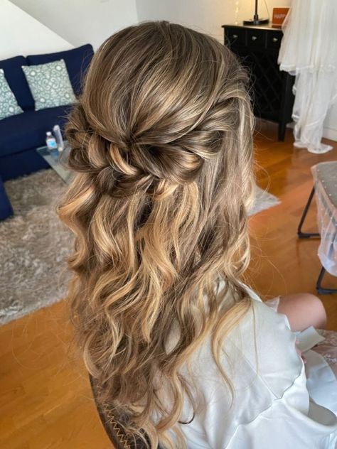 This brides updo has soft curls twisted back into a half up half down hairstyle #hairstyles #hairideas #cutehairstyle Half Up Half Down Wedding Hair Woth Hair Piece, Half Up Curls Wedding, Soft Curl Half Up Half Down, Brides Half Up Half Down Hair, Bridal Twist Hairstyles, Bridal Hair Half Up Brunette Front View, Wedding Hair Half Up Curls, Twisted Half Up Half Down, Half Up Half Down Homecoming Hair