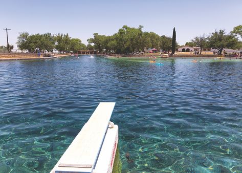 For over eight decades, the world’s largest spring-fed swimming pool at Balmorhea State Park in Toyahvale, Texas has offered visitors a place to swim, snorkel and cool off in the soothing waters of the San Solomon Springs. Balmorhea State Park is a local landmark and an oasis from the summer heat - a short 43-mile drive southwest of Pecos. Pecos Texas, Balmorhea State Park, Texas Summer, Cattle Drive, Centennial Park, Texas History, Blue Spring, Spring Water, Blue Springs