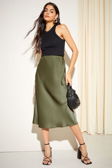 Olive Green Midi Skirt Outfit, Olive Turtleneck Outfit, Olive Green Satin Skirt Outfit, Olive Outfits For Women, Green Silk Skirt Outfit, Olive Skirt Outfit, Olive Green Skirt Outfit, Green Satin Skirt Outfit, Green Midi Skirt Outfit