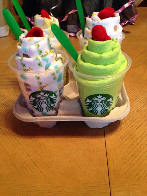 Baby Shower Gift Idea made with socks,receiving blankets,baby spoons & Starbucks cups. Diy Baby Shower Gifts, Shower Bebe, Baby Diy, Diaper Cakes, Baby Shower Diy, Starbucks Drinks, Diy Baby, Baby Crafts, Shower Party