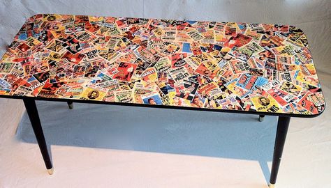 decoupage table top - Possibility for desk/craft table using old movie posters??? Sticker Table Top, Stickers On Furniture, Wallpaper Table Top, Decoupage Table Top Ideas, Decoupage Table Top, Nail Knowledge, Collage Table, Sticker Table, Decoupage Table