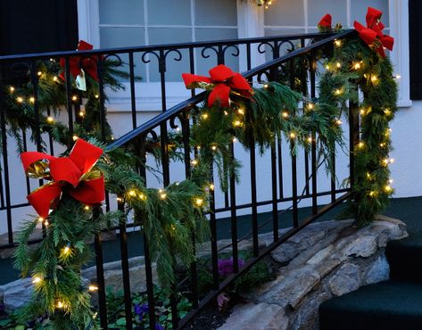 How To Decorate A Deck For Christmas, Garland On Outdoor Railing, Christmas Front Porch Railing Decor, Christmas Deck Railing Decorating Ideas, Outdoor Railing Christmas Decorations, Christmas Railing Decor Outdoor, Garland On Porch Railing, Garland Porch, Xmas Stairs