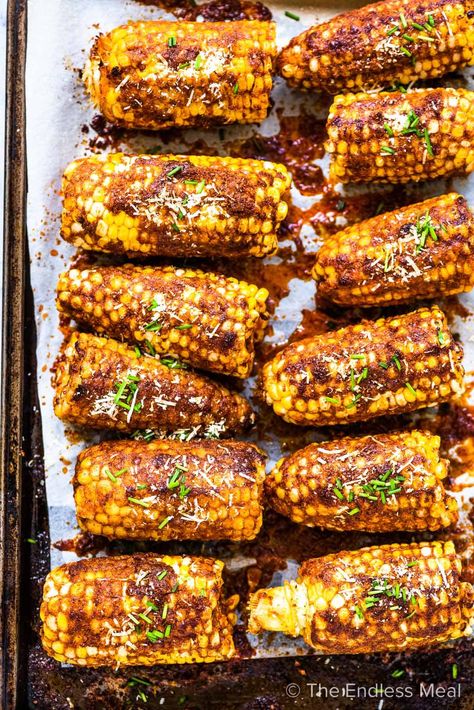 PIN TO SAVE FOR LATER! Smoky parmesan corn on the cob is the ultimate summer recipe. The corn is coated in a garlicky parmesan butter then grilled (or roasted) until deliciously smoky perfection. It's a super easy to make and healthy side dish that everyone loves! #theendlessmeal #parmesancorn #parmesancornonthecob #cornonthecob #corn #cornrecipes #cornonthecobrecipes #bbqrecipes #healthyrecipes #easyrecipes #summer #summerrecipes #vegatarian #vegan #glutenfree Parmesan Corn On The Cob, Corn Recipes Cob, Parmesan Corn, Parmesan Butter, Bbq Corn, Juicy Baked Chicken, Vegetarian Bbq, Buttered Corn, Baked Corn