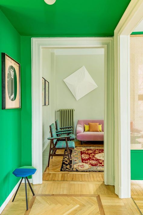 An emerald green entryway hints at the colourful interior that lies beyond. Colorful Apartment, Colorful Interior, Simple Wallpaper, Interior Wallpaper, Bright Walls, Retro Kitchen Decor, Color Interior, Colourful Living Room, Green Interiors