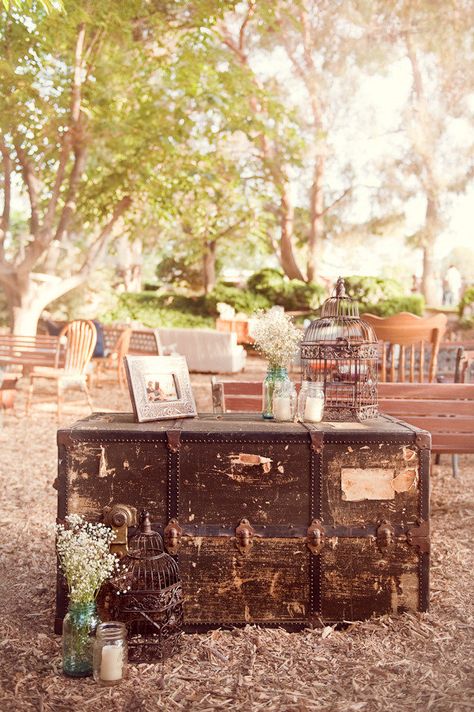 Love this vintage trunk, birdcages, & mason jars with flowers & candles Trunk Wedding Decor, Simple Wedding Reception, Nevada Wedding, Wooden Trunk, Deco Champetre, March Wedding, Vintage Picnic, Mason Jar Flowers, Rustic Chic Wedding