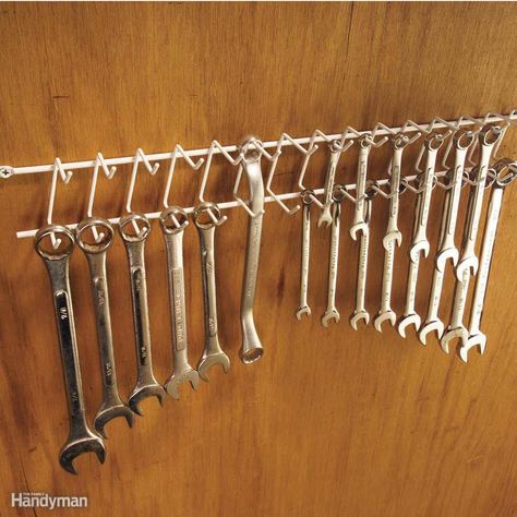 A Wrench Rack From the Clothes Closet Belt Rack, Hollow Core Doors, Pipe Insulation, Plastic Buckets, Clutter Organization, Cord Storage, Closet Rod, Sliding Door Hardware, Diy Closet