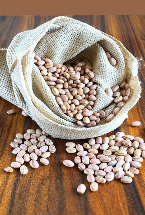 Carioca beans. Brazilian bean in a jute bag. royalty free stock photography Jute Bag, Recipe Images, Jute Bags, Stock Photography Free, Wooden Table, Stock Photography, Royalty, Royalty Free, Stock Images