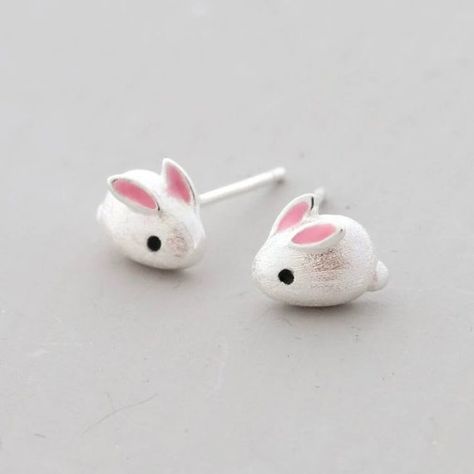 925 Sterling silver cute bunny rabbit earring studs A pair of sweet bunny earrings made in sterling silver with pink enamel details. With two long pink ears, black eyes and little tails, the design creatively keeps all the cuteness of a bunny rabbit. A lovely gift for Easter, Christmas and Birthdays! These studs are medium-sized, however, they are perfect for young ones who have had their ears pierced for the first time. Also, if you have several piercings, you may wear these earrings with our o Pink Clay Earring Ideas, Animal Earing, Cute Earrings Studs, Polymer Clay Bunny, Clay Bunny, Bunny Jewelry, Cute Bunny Rabbit, Rabbit Jewelry, Ears Pierced