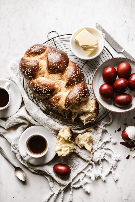 TSOUREKI - Greek Pascha Bread This sweet braided bread is infused with Greek flavors mastiha, mahlepi & orange. A delicious part of Greek Pascha traditions, this bread is so good, you will want to make it year round!  #tsoureki #greekrecipes #braidedbread #foodstyling #foodphotography #greekeaster Cinnamon Knots, Greek Easter Bread, Greek Bread, Bread Photography, Rolls Food, Brioche Rolls, Sugar Bread, Pane Dolce, Egg Coffee