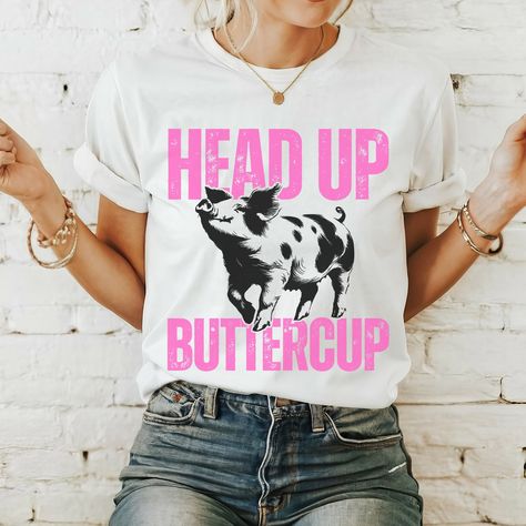 Head Up Buttercup Show Pig Tee Pig Show Stock Show Mom Shirt FFA 4H County Fair State Fair Agriculture Farming Tee This classic unisex jersey short sleeve tee fits like a well-loved favorite. Soft cotton and quality print make users fall in love with it over and over again. These t-shirts have-ribbed knit collars to bolster shaping. The shoulders are tapered for a better fit over time. Dual side seams hold the garment's shape for longer.  .: Made with 100% Airlume combed and ring-spun cotton, a What To Wear To A County Fair, County Fair Shirts, 4h Buyers Gift Ideas Pigs, Buyers Gifts 4-h, Pig Showing, School Shirt Designs, Farm Tees, Stock Show, Pig Shirts