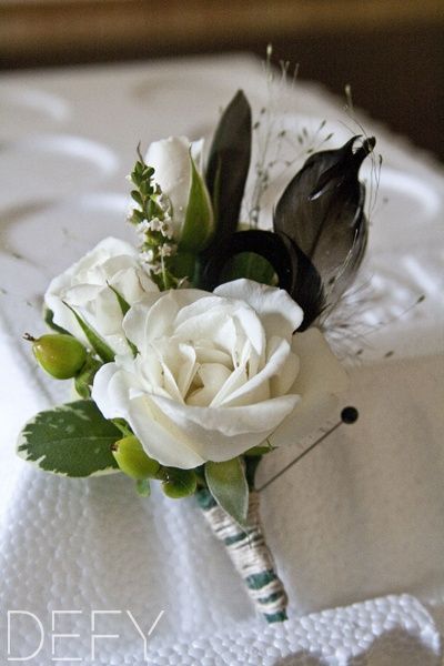 duck feathers Duck Season, Groom Boutonniere With Feather, Duck Feather Boutonniere, Duck Wedding, Feather Wedding Decorations, Classic Wedding Flowers, Prom Flowers Corsage, Feather Boutonniere, Wedding Groomsmen Attire