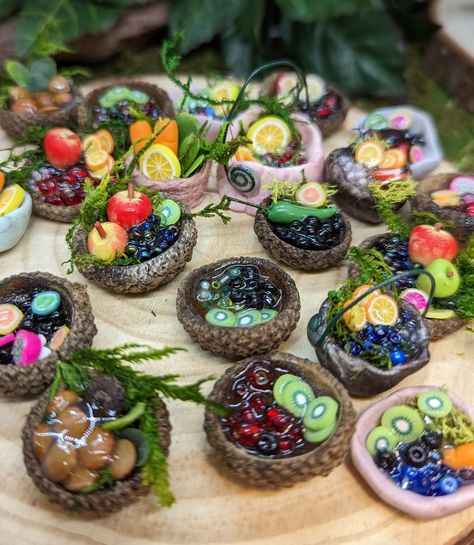 One of a kind handcrafted miniature food - Fairy Food Baskets with fruit, vegetables and seeds The fairies have returned from a faraway land and brought back some fairy plants, berries and vegetables to place in their baskets! These one-of-a-kind bright and colorful fairy bowls and baskets hold a plethora of magical fairy food, and natural items to make some amazing snacks and meals, as well as poultices and medicinal salve for the fairies and their friends! These pieces are handcrafted by mysel Faerie Village, Fairy Trinkets, Fairy Basket, Fairy Plants, Fairy Party Food, Amazing Snacks, Bright Forest, Garden Dollhouse, Food Baskets