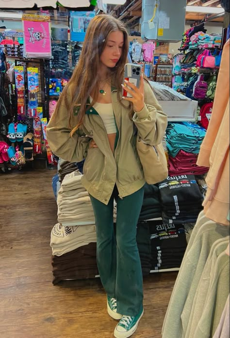 Turquoise Jeans Outfit, Green Flare Cargo Pants Outfit, Green Flared Jeans Outfit, Outfits With Green Flare Leggings, Green Coudroy Pants Outfits, Green Flair Leggings Outfit, Green Curdory Pants Outfit, Flared Jeans With Converse, Green Flares Outfit