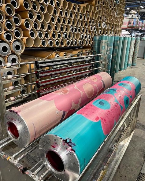 Step inside the Marimekko printing factory. 🌸 Many of you are curious to visit the heart and soul of Marimekko’s print design at our factory in Helsinki, so we wanted to give you the next best thing: an insider look behind the scenes. 🎫 1–2 Rotary screens used to print Unikko on the rotary printing machine. 3 Buckets of dye waiting to be transferred inside of the rotary screens. 4-5 Each color is pushed through a screen with a weighted metal rod to print the different parts of our beloved... Rotary Screen Printing, Printing Machine, Heart And Soul, Step Inside, Buckets, Helsinki, Behind The Scenes, Screen Printing, Print Design