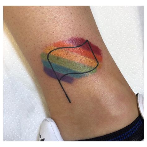 A pride flag tattoo where the rainbow effect exceeds the borders of the flag. Enby Tattoo, Pride Flag Tattoo, Transgender Tattoo Ideas, Prism Tattoo, Awareness Tattoos, Lgbt Tattoo, Gay Tattoo, Shoe Tattoos, Pride Tattoo