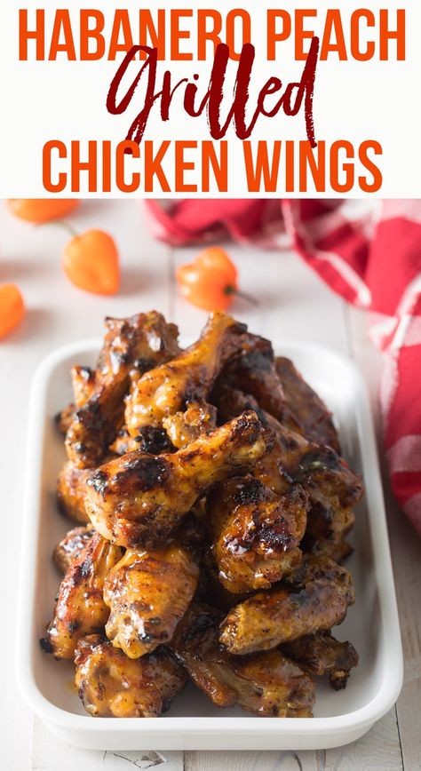 Habanero Peach Grilled Chicken Wings: This 5-ingredient spicy grilled wings recipe is super easy to make and packed with spicy-sweet flavor! #ASpicyPerspective #grilling #grilled #peach #habanero #wings #buffalo Peach Habanero Chicken, Grilled Wings Recipe, Peach Grilled, Crispy Grilled Chicken, Habanero Wings, Chicken Wing Sauce Recipes, Grilled Chicken Wings Recipe, Wings Buffalo, Wing Sauce Recipes