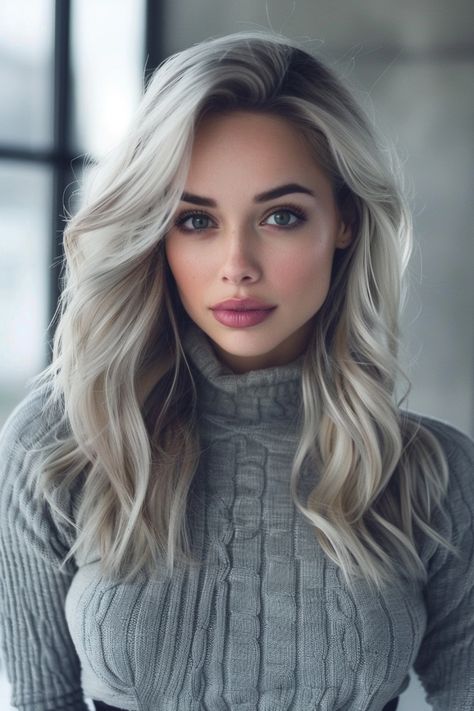 Keep it trendy and low-maintenance with blonde hair featuring dark roots for a bold, contrasting look. See more styles here. Chic Blonde Hair, Ash Ombre, Blonde Hair With Dark Roots, Hair With Dark Roots, Shoulder Length Blonde, Enhance Natural Curls, Blonde Lob, Icy Blonde Hair, Blonde Wavy Hair