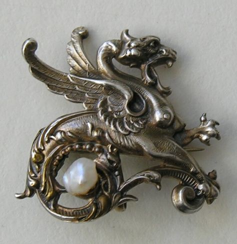 Victorian Griffin Freshwater Pearl Sterling Watch Pin/Brooch This fun Victorian brooch/watch pin features a griffin set with a freshwater pearl. The brooch measures 1 inch in diameter and is marked L (Link and Angell) and sterling. The brooch has it's original fittings and is in excellent condition. Dragon Brooch, Ladies Jewellery, Victorian Brooch, Junk Jewelry, Dragon Jewelry, Silver Dragon, Art Nouveau Jewelry, Iron Age, Victorian Jewelry